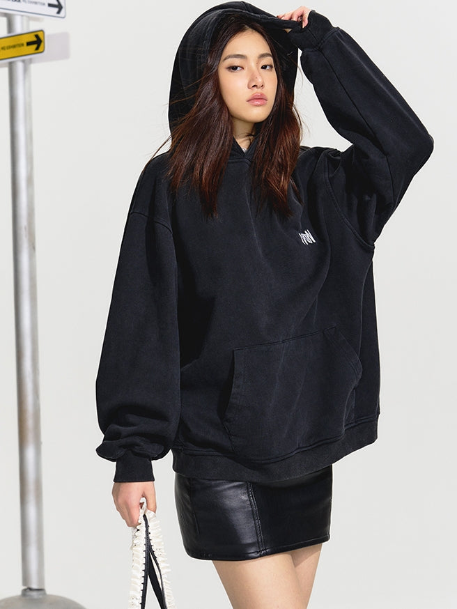 NOTAWEAR Stylish Black Oversized Hoodie with Faux Leather Mini Skirt for Women - Casual and Chic Outfit