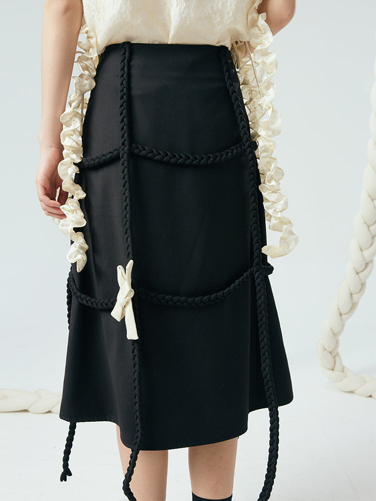 braided staggered bow embellished skirt