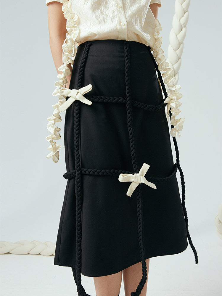 braided staggered bow embellished skirt